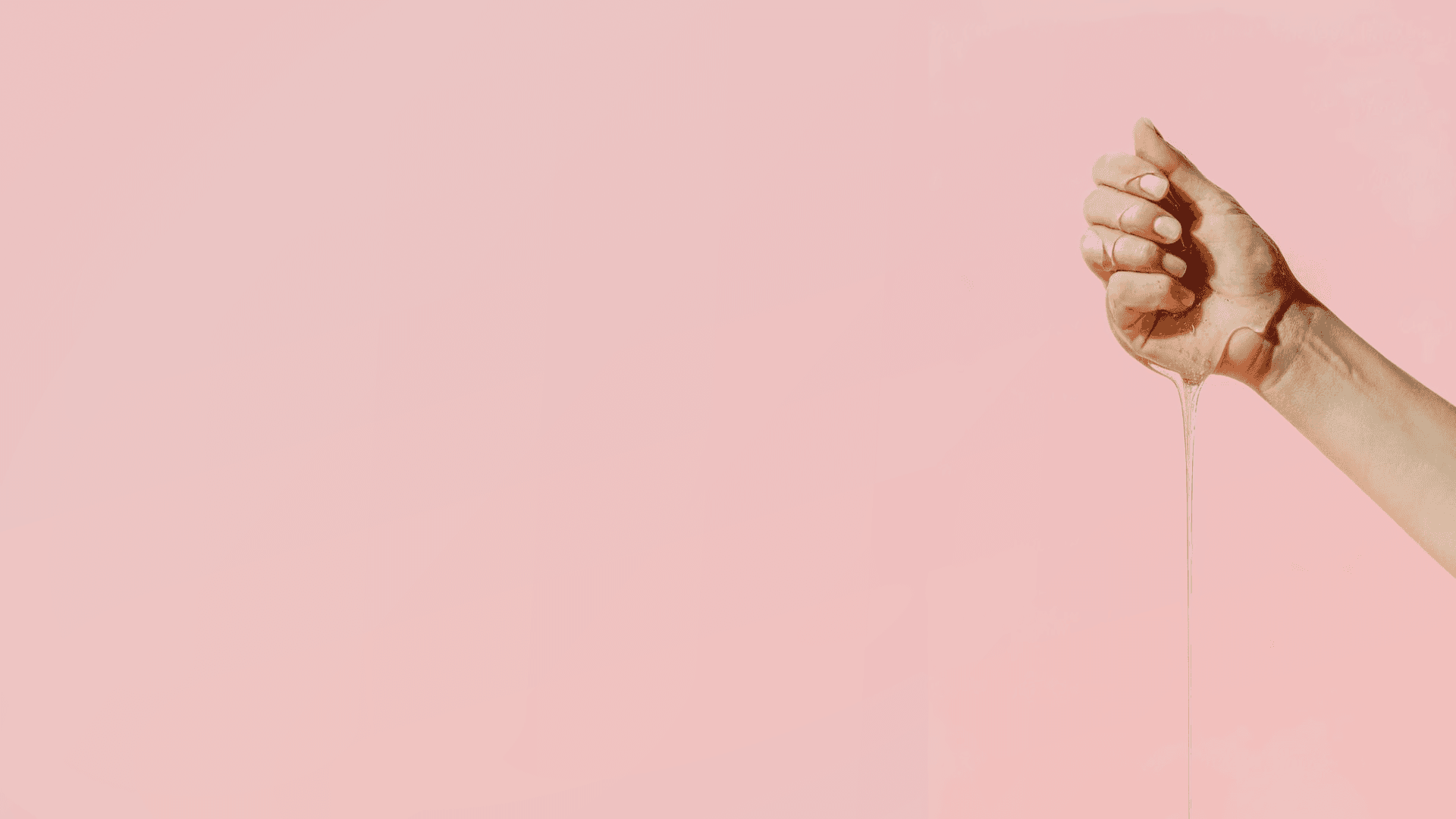 Sugar me Softly skincare hero - hand with dripping liquid